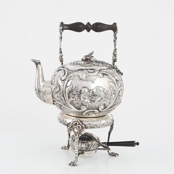 A German silver teapot on rechaud, mark of J.D. Schleissner & Söhne, Hanau, circa 1900.