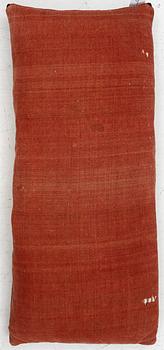 A carriage cushion, knotted pile in relief, ca 106 x 47, southwest of Scania, Sweden, circa 1800.