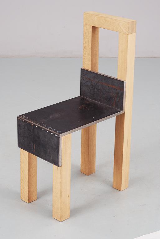 A Jonas Bohlin 'Sto' iron and oak chair, Stockholm 1990.