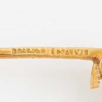 Brooch, 18K gold set with rose-cut and old mine-cut diamonds and probably synthetic rubies, circa 1900.