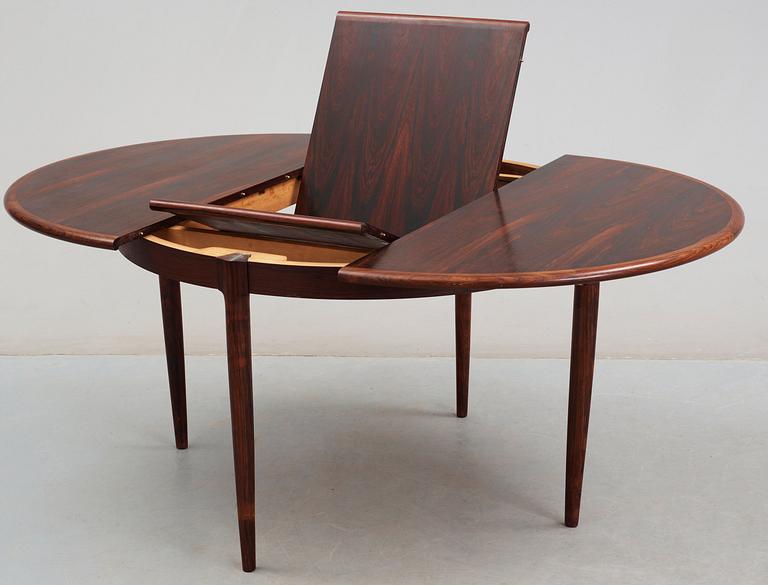 A Niels Ole Møller palisander dining table and and five chairs, J.L. Møller, Denmark 1950's-60's.