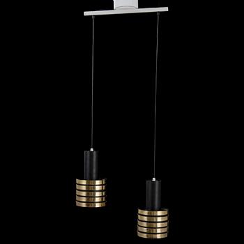 A pair of mid 20th century 'K2-49' pendant light for Taito, Finland.