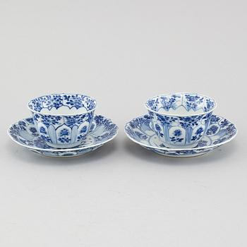 A pair of Kangxi  (1662-1722) Chinese porcelain cups with saucers.