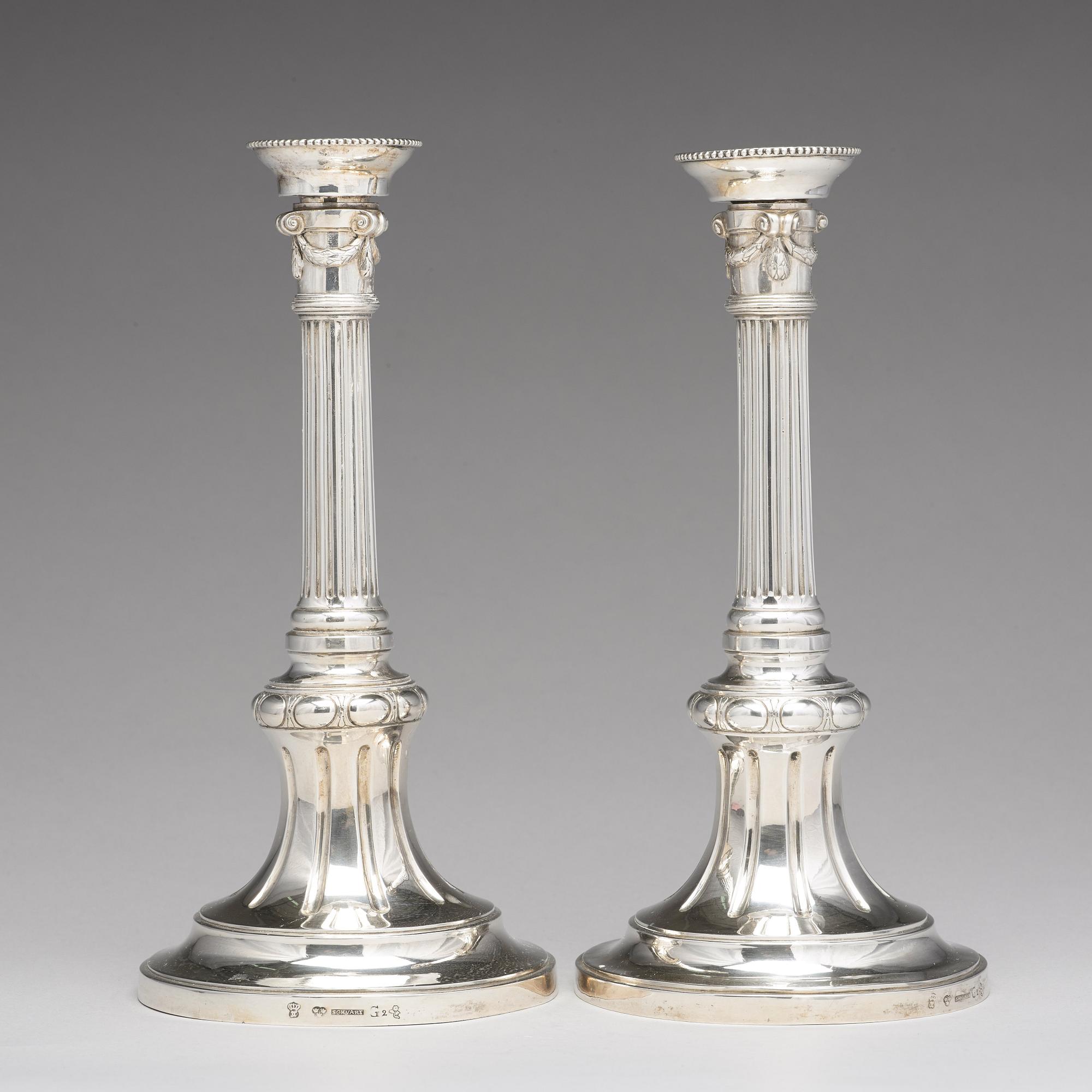 A pair of Swedish Gustavian silver candlesticks, mark of Johan Henrik Schvart, Karlskrona 1789.