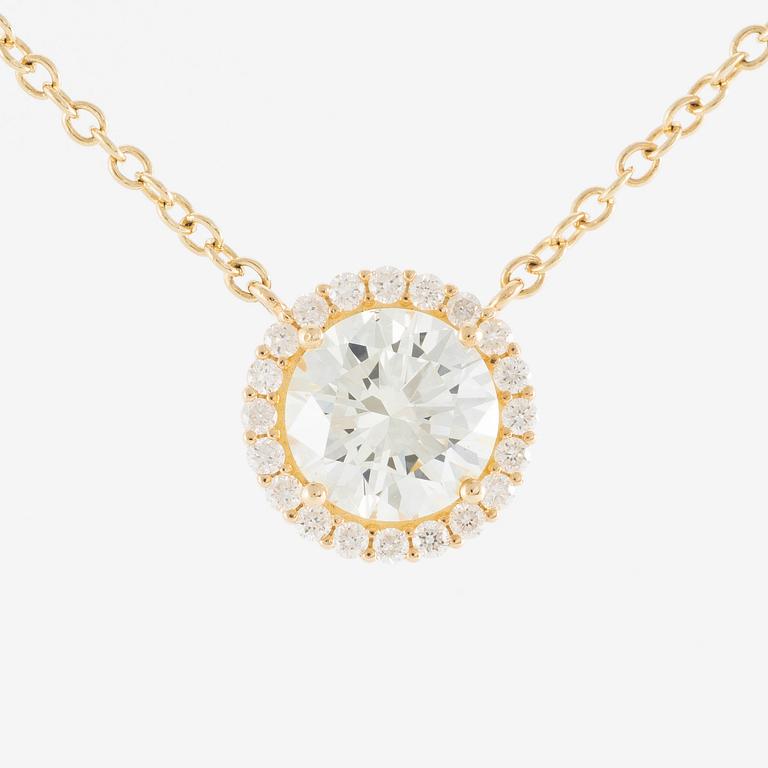 Collier 18K guld med briljantslipade diamanter.