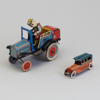 DISTLER COMIC CAR & GEORG FISCHER PENNY TOY, Germany, first half of the 20th century.