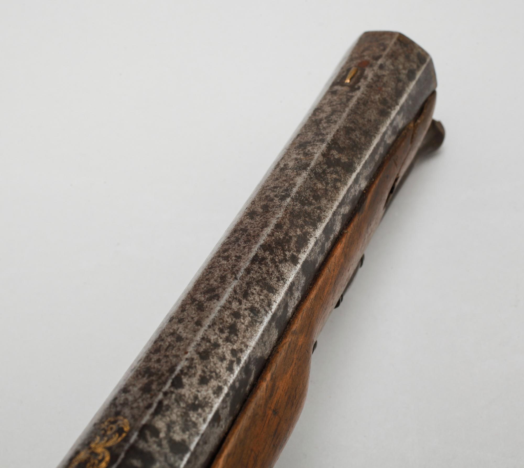 A pair of percussion guns, around the mid 19th century.