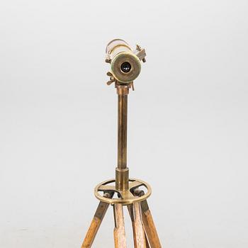 A brass and leahter tube binocular with stand around 1900.