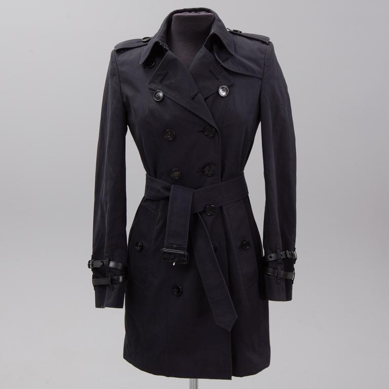 Burberry, a black cotton trenchcoat, UK size 8 (36).