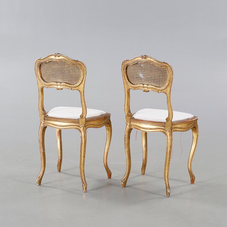 A pair of chairs from the first half of the 20th century.