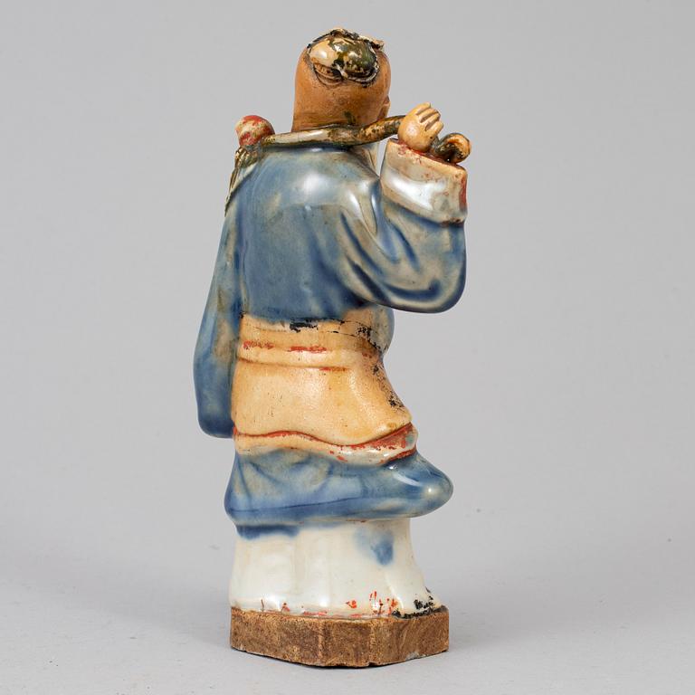 A clay figure of a daoist, 20th century.