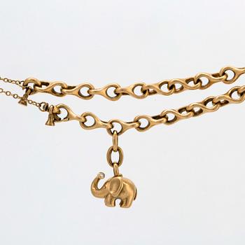 Lynggaard, bracelet 18K gold 1 elephnat charm w 1 brilliant-cut diamond, approx 18 cm.