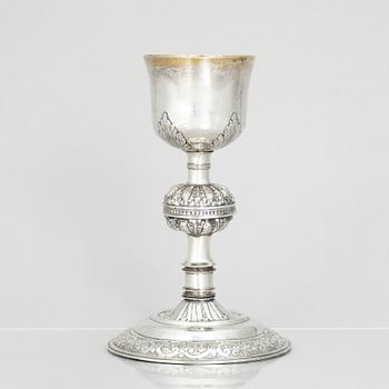 An 18th century parcel-gilt silver cup and paten, unmarked.