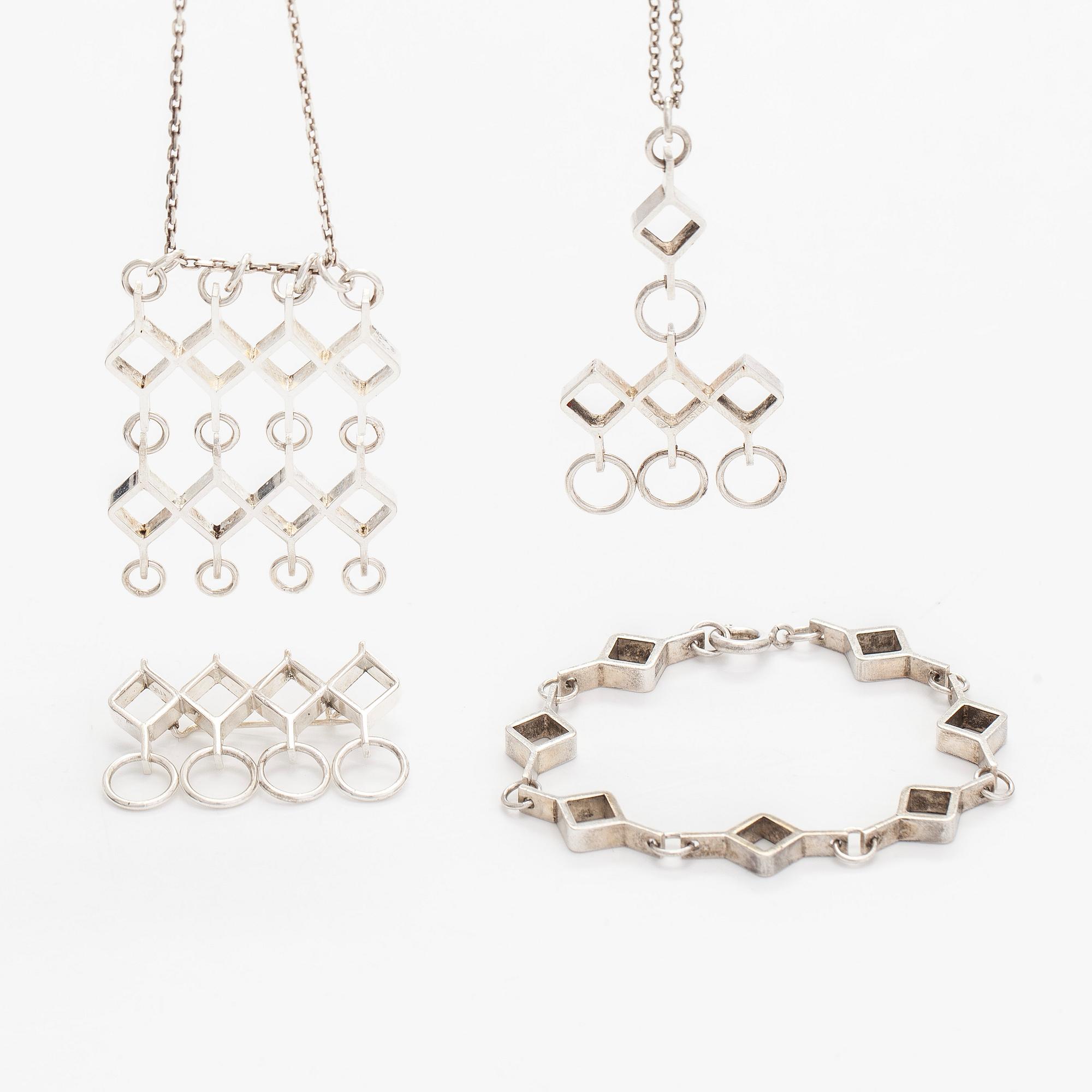 Jorma Laine, a set of two silver pendants, a bracelet and a brooch. Kultateollisuus Oy, Turku 1965-1972.