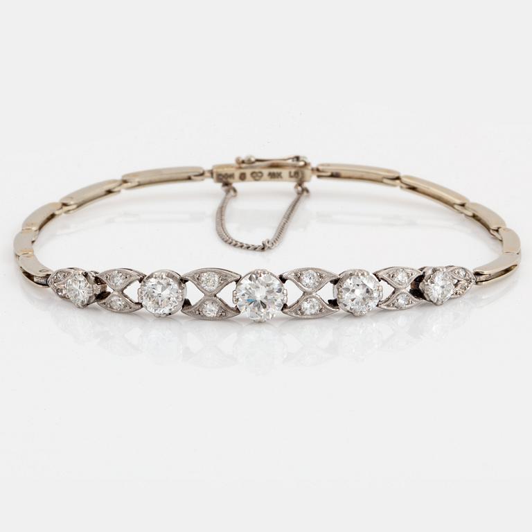 Armband 18K guld och vitguld med gammal- och åttkantslipade diamanter av CG Hallberg.