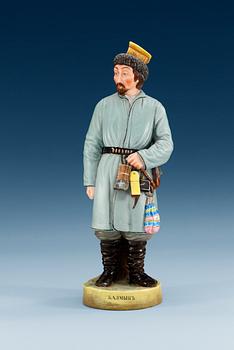 1347. A Russian bisquit figure of a Kalmykian man, Gardner/Kuznetsov manufactory, ca 1900.