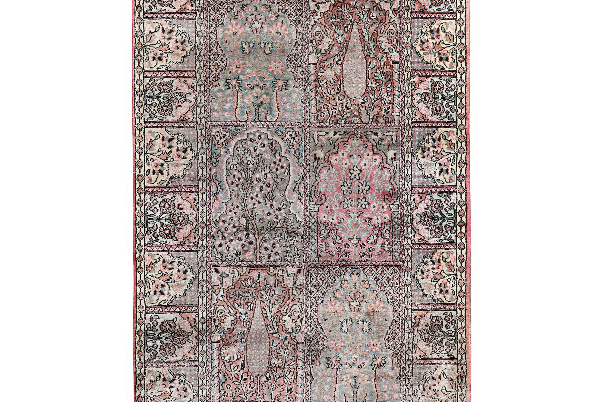 A Kashmir runner carpet, silk, c. 364 x 97 cm.