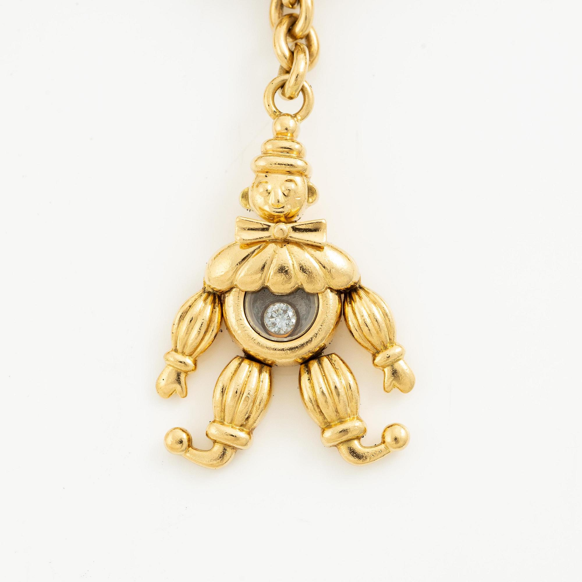 Chopard armband med berlocker 18K guld med runda briljantslipade diamanter.