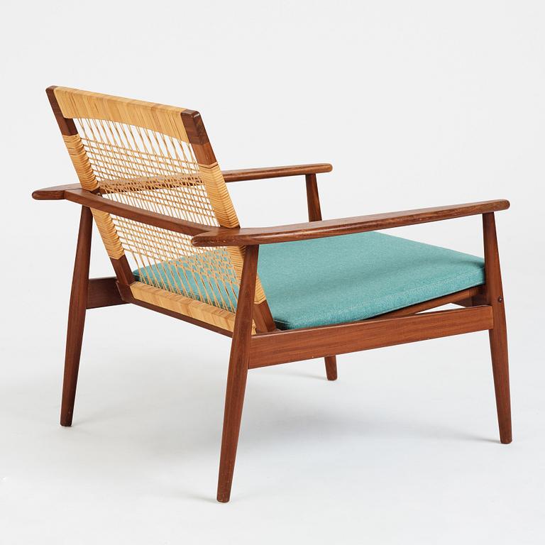 Hans Olsen, a model 519 teak easy chair for Juul Kristensen, Denmark, 1950's.