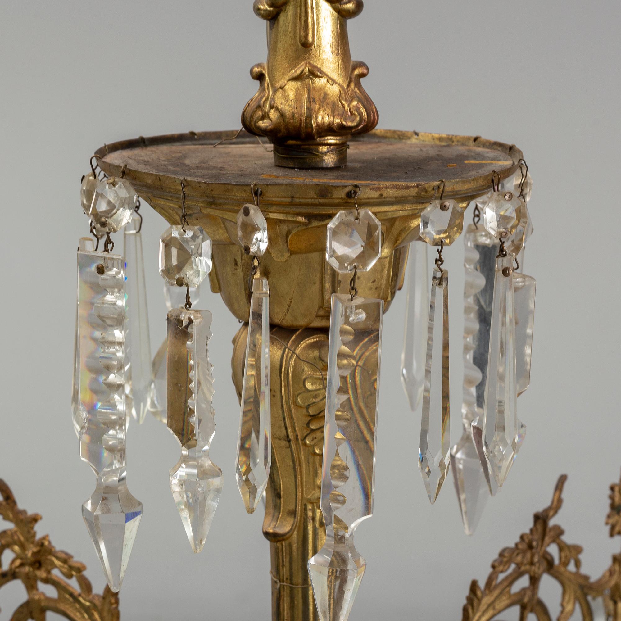 A late 19th century brass ceiling light.