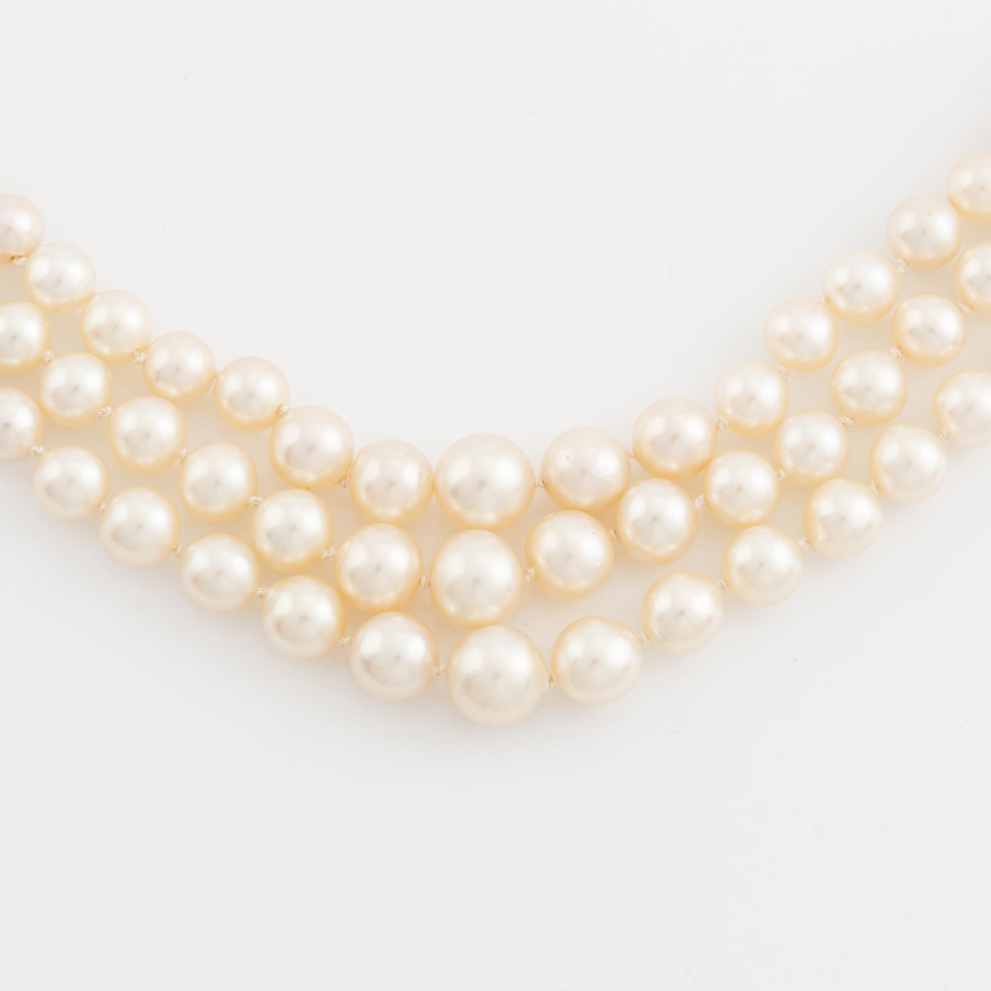 Three strand calibrated cultured pearl necklace, clasp with pearl and rose cut diamonds.