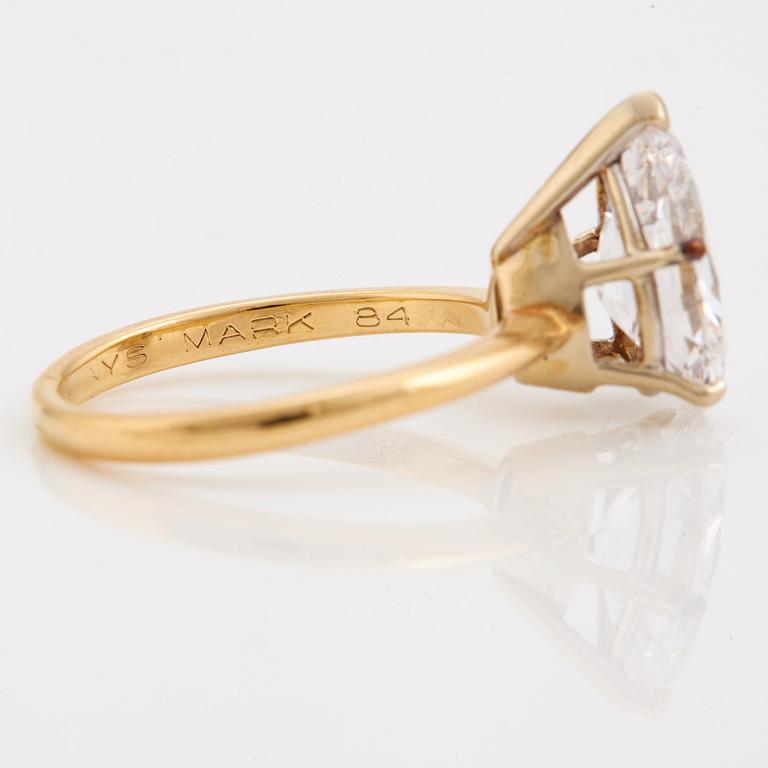 A pear cut diamond ring.