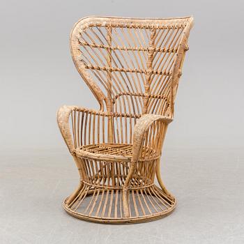 a rattan chair by Gio Ponti & Lio Carminati, Italy, second half of the 20th century.