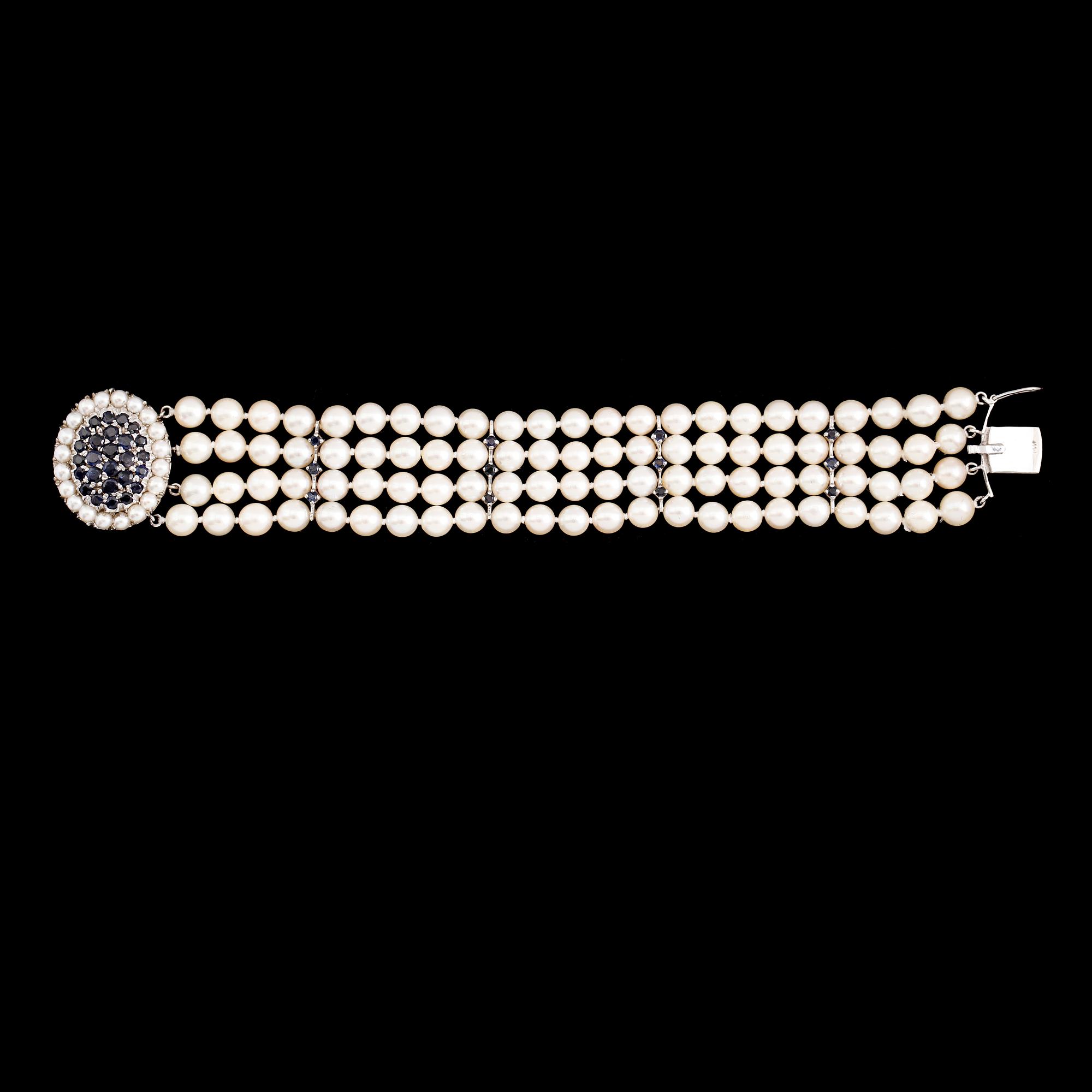 ARMBAND, 14 k vitguld, odlade pärlor, safirer tot ca 4.65 ct.