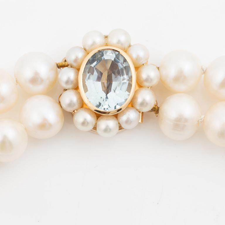 Pearl necklace, double-stranded with cultured freshwater pearls, clasp 18K gold set with aquamarine and cultured pearls, Jarl Sandin.