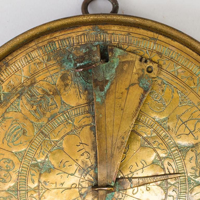 A 18th century bronze sundial.