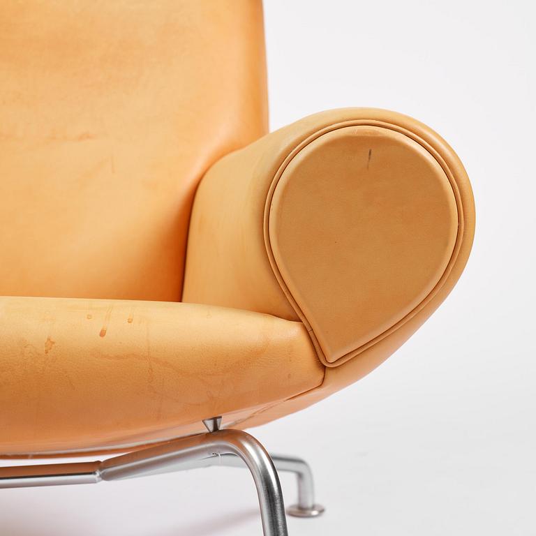Hans J. Wegner, an “Ox Chair” with footstool, Erik Jørgensen, Denmark.