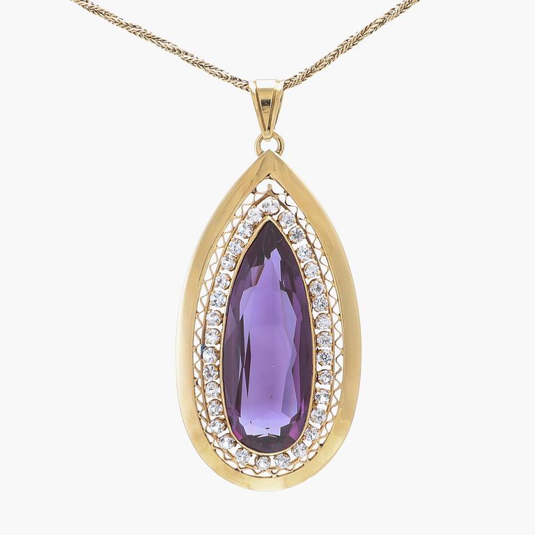 Necklace 18K and 14K gold with faceted synthetic purple sapphire.