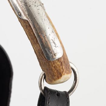 Yves Saint Laurent, a 'Mombasa' leather bag.