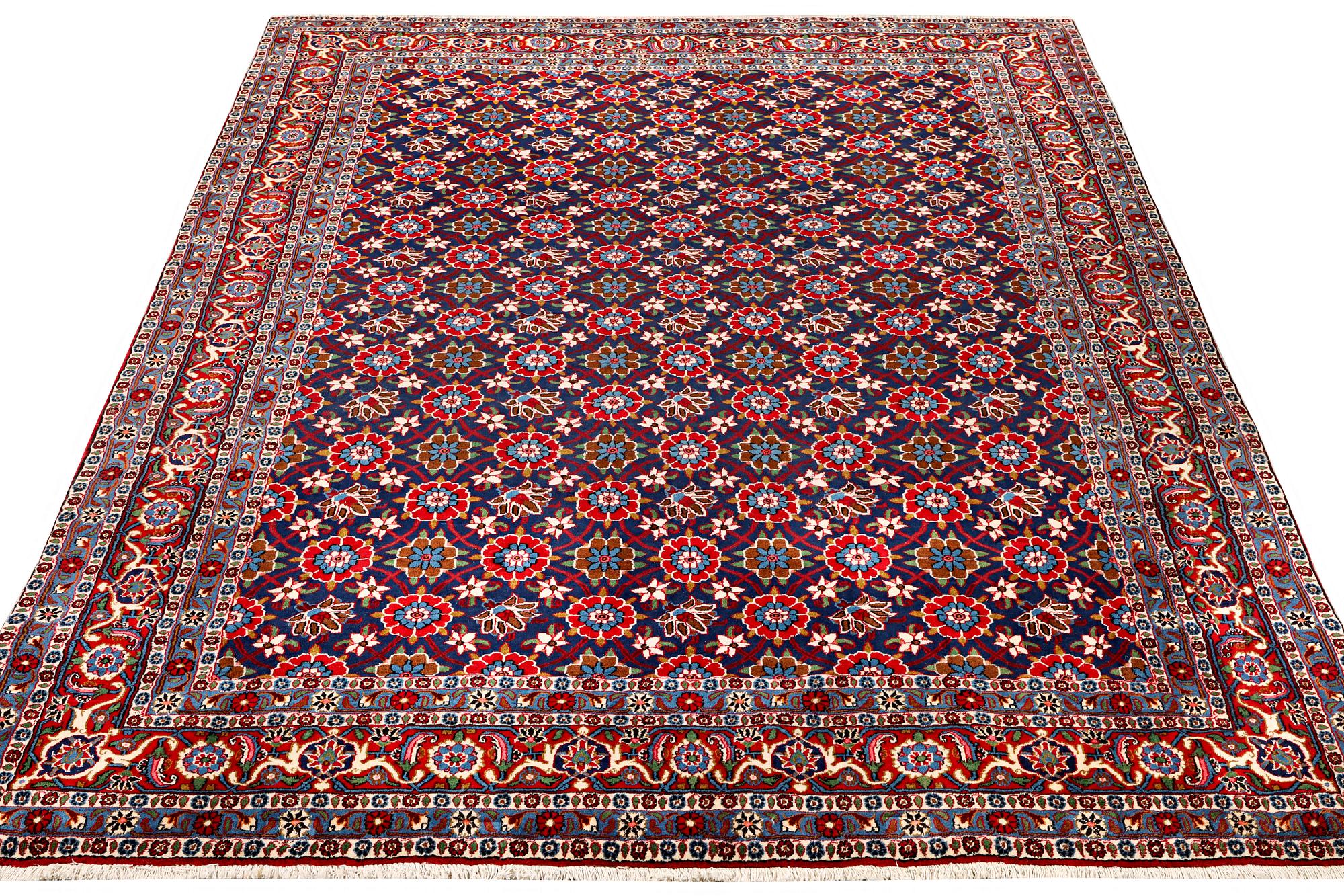 A semi-antique Vermain carpet, c. 339 x 233 cm.