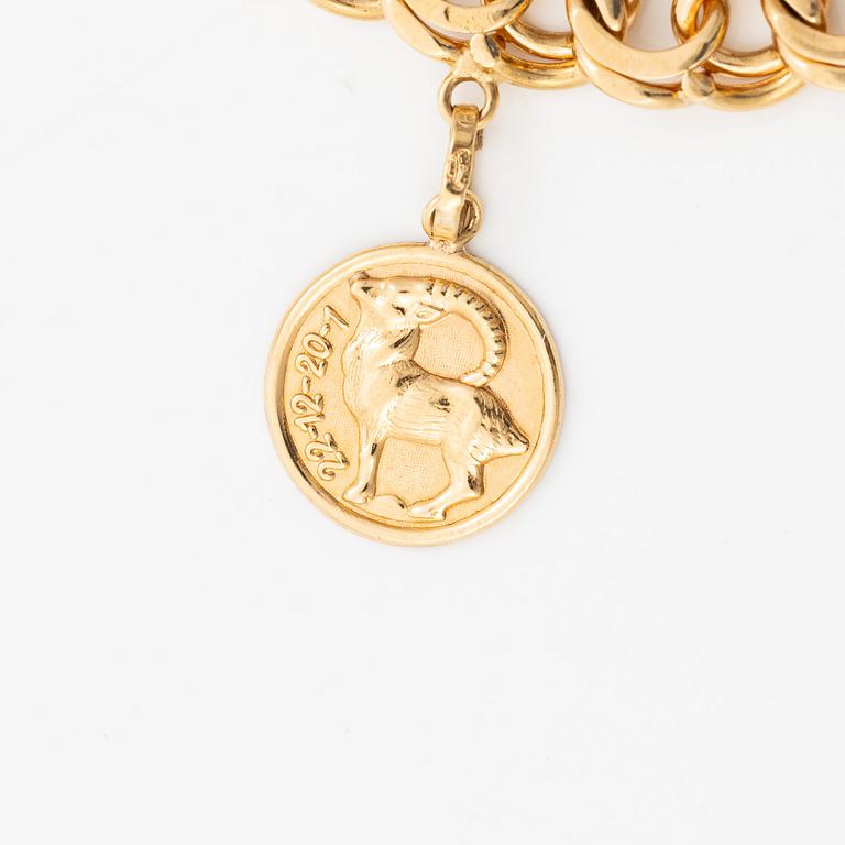 Bracelet, 18K gold, with charms including zodiac signs.