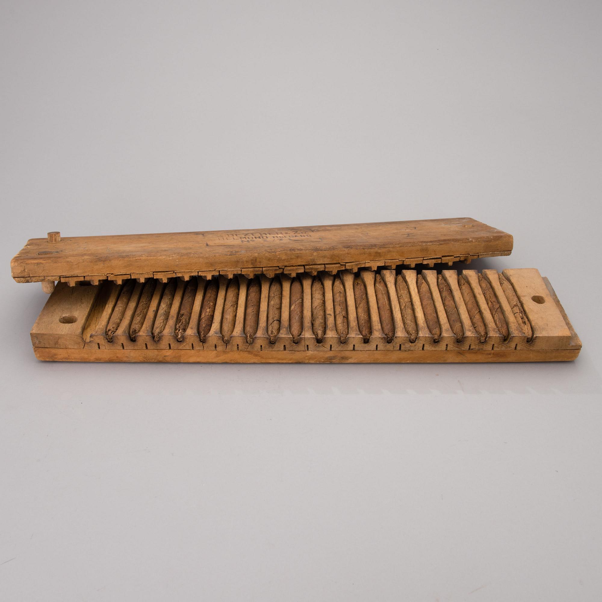 A CIGAR FORM, wood, first half of the 20th century.