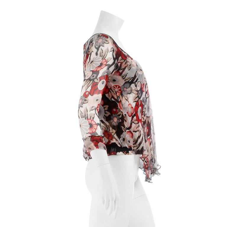 KENZO, a cotton/chiffon flowerprinted blouse.