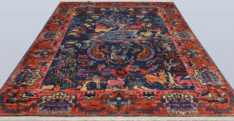 A figural Ziegler carpet, 299 x 204 cm.