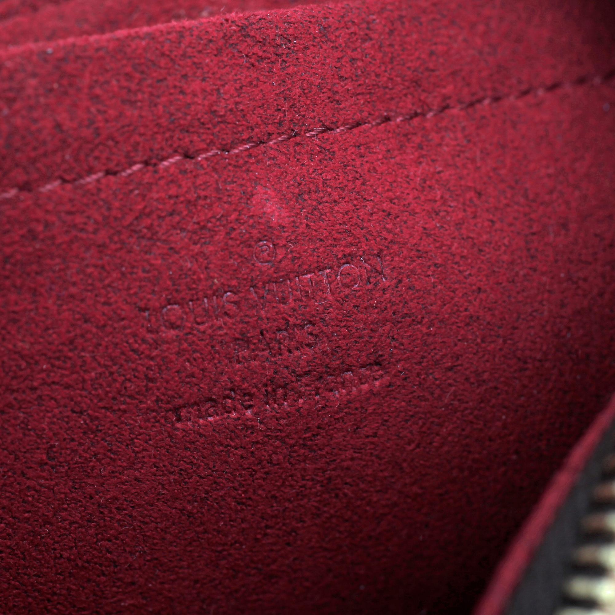 LOUIS VUITTON, a Damier Ebene canvas "Mini Pochette" evening bag.