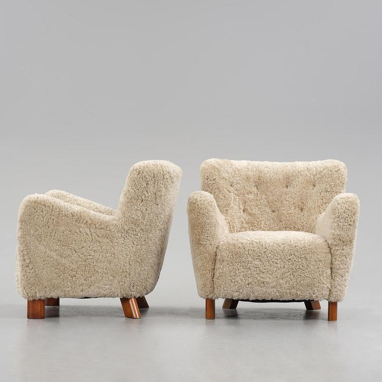 Fritz Hansen, a pair of easy chairs model "1669", Denmark, 1940s.