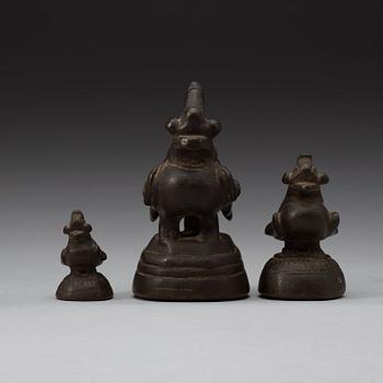 A set of eight Burmese bronze weights, 19th century.