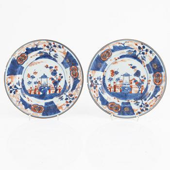 An Imari porcelain bowl and a pair of plates, Qing dynasty, China, 18th century.