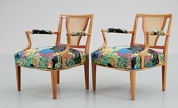 A pair of Josef Frank mahogany and rattan armchairs, Svenskt Tenn,