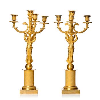 103. A pair of Empire candelabras for four lights, beginning of the 19th century.