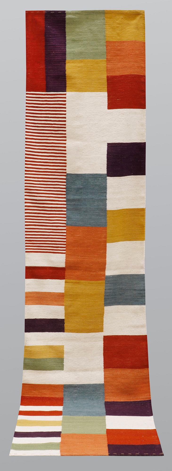 A runner, flat weave, ca 335 x 85 cm.