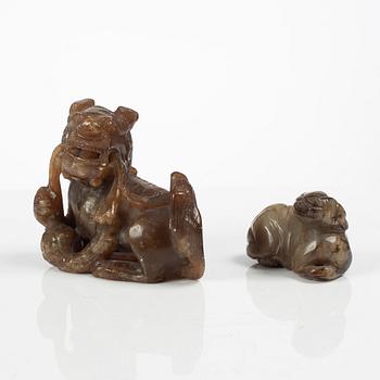 A group of two Chinese stone figures and a stone plaque, late Qing dynasty/early 20th century.