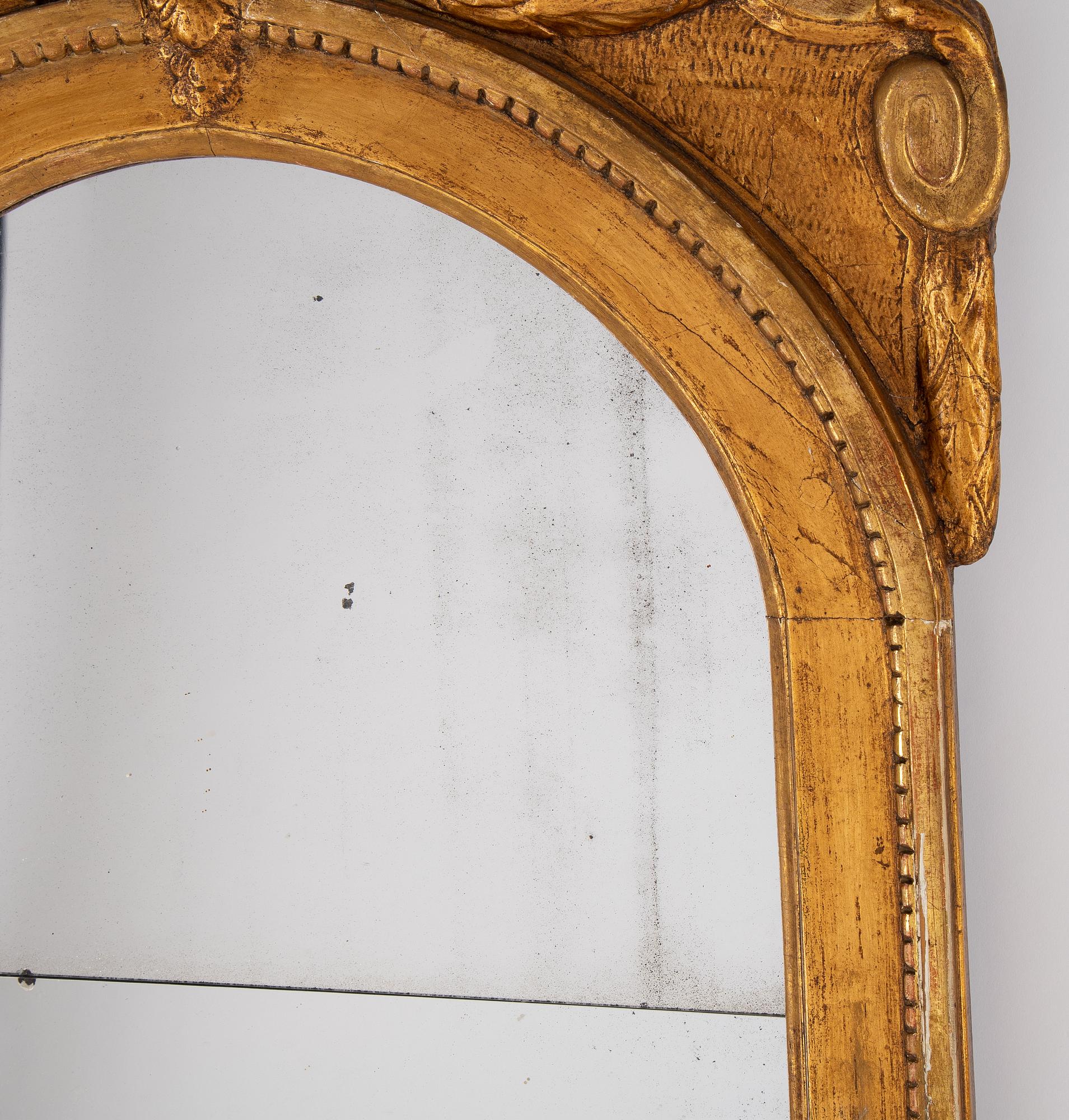 A gilt mirror, Stockholm, second half of the 18th Century.