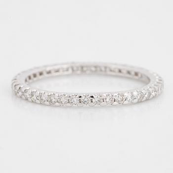 ALLIANSRING, tunn, 18K vitguld med runda briljantslipade diamanter.