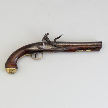 A early 19th century walnut flintlock pistol markt Turner.