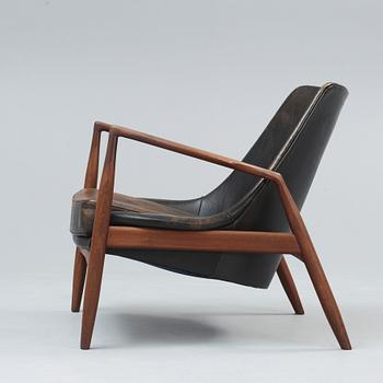 An Ib Kofod Larsen 'Sälen' teak and black leather armchair, OPE, Jönköping, Sweden 1950's-60's.